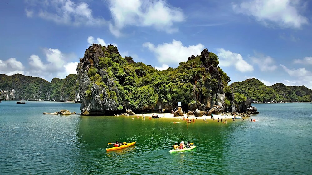 Peaceful Van Boi beach, clear waters, surrounded by stunning karsts